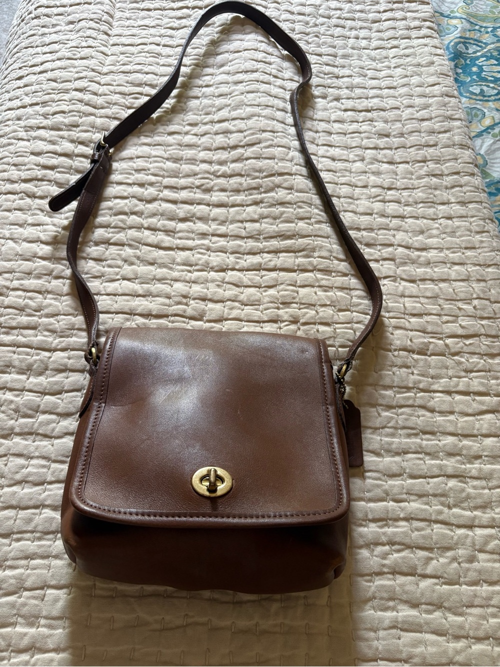 Coach Brown Leather Crossbody Bag with Turn-Lock Closure